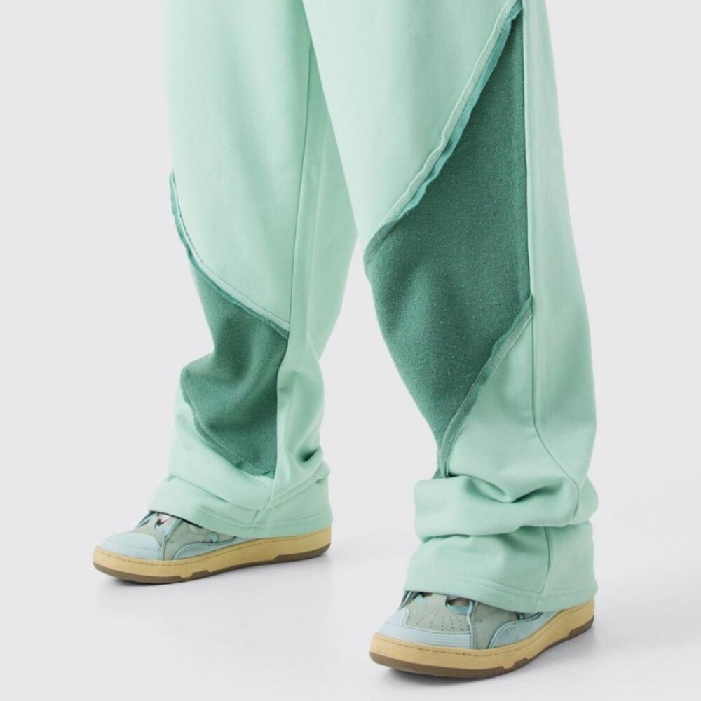 Plus Size Relaxed Fit Joggers with Raw Hem and Panel Detailing